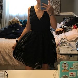 Black dress with textured overlay